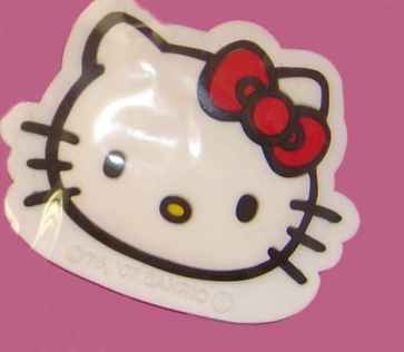 Hello Kitty Magnet Face, red